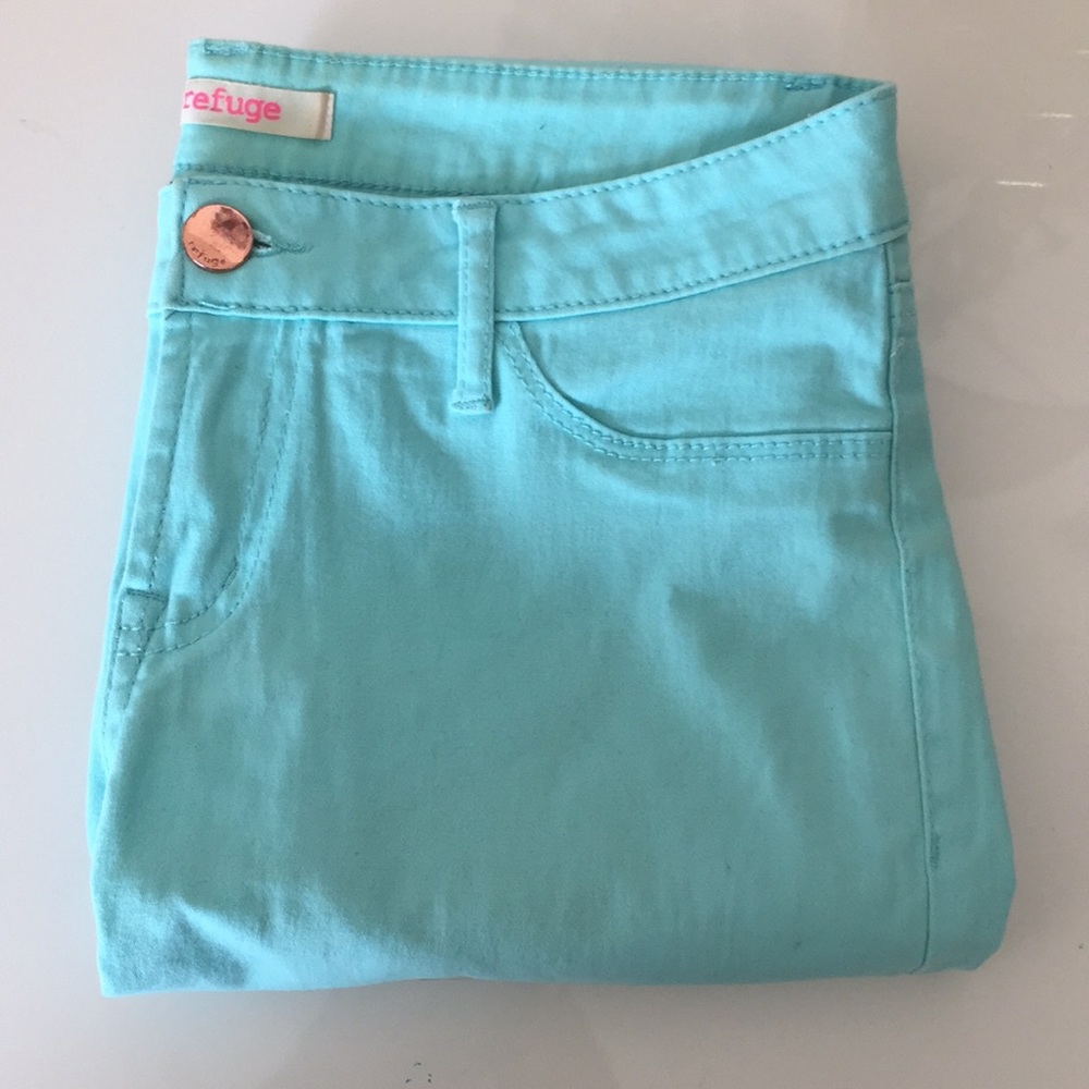 Bright teal skinny jeans